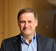 Headshot of Robert Grundy. Keynote speaker at Research & Innovation 2025